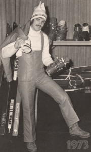 Gary Breisch showcasing ski clothing at Oklahoma State University in 1973 for how to dress for snow skiing vacation and spring break trip.